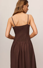 Z SUPPLY Esti Maxi Dress in Chocolate Cherry, back view on model showing smocked bodice, spaghetti straps, and flowy skirt.