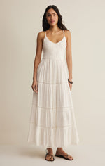 Z SUPPLY Behati Eyelet Midi Dress in white with smocked bodice, tiered skirt, and delicate eyelet trim worn by model