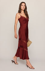 Z Supply Bruna Lace Inset Midi Dress in Velvet Rouge on model, deep burgundy satin slip dress with lace trim and flared hem