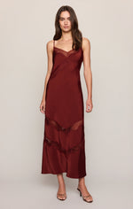 Z SUPPLY Bruna Lace Inset Midi Dress in Velvet Rouge, a deep burgundy satin slip dress with lace chevron panels, worn by a model