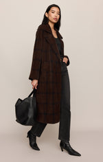 Z SUPPLY Crosby Plaid Cocoon Coat in dark chocolate brown plaid, worn by model with dark jeans and black ankle boots, full-length side view.