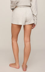 Z SUPPLY Waffle Short in Feather Grey, back view on model, paired with matching long-sleeve top, barefoot