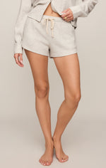 Z SUPPLY Waffle Short in Feather Grey with cream drawstring waistband, worn by model with matching waffle-knit top, front view