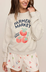 Z SUPPLY Home Grown Sweatshirt in Feather Grey, model wearing oversized crew neck with Farmer's Market tomato graphic, front view