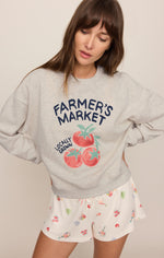 Z SUPPLY Home Grown Sweatshirt in Feather Grey, front view on model, with tomato graphic and 'Farmer's Market Locally Grown' text.