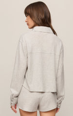 Z SUPPLY Waffle Shirt in Feather Grey, back view on model, cropped fit with collar, long sleeves, button cuffs, matching shorts