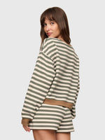Z Supply Low Key Stripe Sweatshirt in Monstera, back view on model, sage green and cream stripes with tan ribbed hem, worn with matching shorts