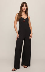 Z SUPPLY Leyla Jumpsuit in Black — model wearing wide-leg spaghetti strap jumpsuit with V-neck, front view