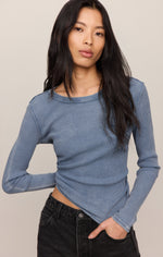 Z SUPPLY Arlet Mini Thermal Top in Mineral Blue, long-sleeve waffle-knit crop top, front view on model with dark jeans
