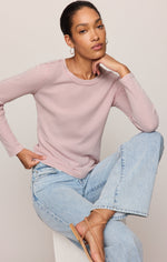 Z SUPPLY Arlet Mini Thermal Top in Soft Blush worn by model with light-wash wide-leg jeans, seated pose, front view