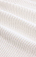 Z SUPPLY Arlet Mini Thermal Top close-up fabric detail showing soft blush waffle-knit texture with subtle horizontal ribbing