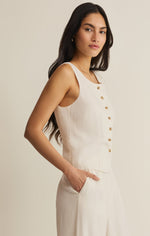Z SUPPLY Roman Linen Vest in Cloud - sleeveless white vest with gold button front detail, modeled on woman