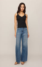 Z SUPPLY Eve Lace Tank in Black, front view on model, featuring scalloped lace trim neckline and straps, paired with wide-leg jeans.
