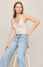 Z SUPPLY Eve Lace Tank in Sandstone — cream V-neck cami with scalloped lace trim, worn with light wash jeans, front view on model