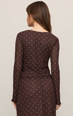 Z SUPPLY Amara Polka Dot Mesh Top in Dark Chocolate, back view on model, long sleeves, sheer mesh fabric with cream dots