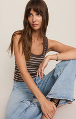 Z SUPPLY Rowe Striped Scoop Tank in Dark Chocolate with cream stripes, worn by model with light-wash wide-leg jeans, front view.