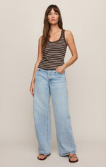 Z SUPPLY Rowe Striped Scoop Tank in Dark Chocolate with cream stripes, worn by model with wide-leg light wash jeans, front view