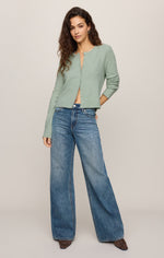 Z SUPPLY Medina Cardigan in Mint Julep, a soft sage-green cropped knit with button front, worn open over wide-leg jeans, front view on model