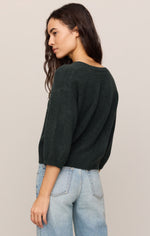 Z SUPPLY Valor Cardigan in Emerald Cove, back view on model, dark green knit with puffed 3/4 sleeves, paired with light wash jeans