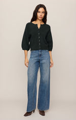 Z SUPPLY Valor Cardigan in Emerald Cove dark green, 3/4 puff sleeves, button front, worn by model with wide-leg jeans, front view