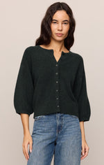 Z SUPPLY Valor Cardigan in Emerald Cove, a dark green button-front knit cardigan with balloon sleeves, worn by a model with blue jeans