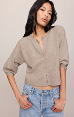 Z SUPPLY Valor Cardigan in Natural Heather — cropped knit cardigan with button front, 3/4 puff sleeves, worn with blue jeans, front view