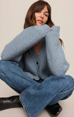 Z SUPPLY Whitmore Cardigan in Mineral Blue, chunky knit with V-neck and buttons, worn by model with wide-leg jeans and black boots