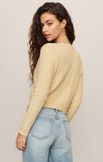 Z SUPPLY Cera Long Sleeve Cardigan in Lemon Chiffon, back view on model, cable-knit texture, cropped fit with light wash jeans