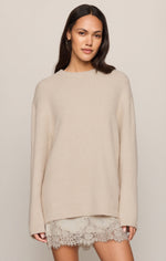 Z SUPPLY Chill Mode Sweater in Frosted Pearl — oversized cream knit pullover with crew neck, worn by model over lace mini skirt, front view