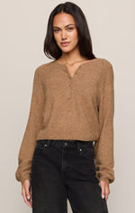 Z SUPPLY Westmont Henley Sweater in Golden Caramel, front view on model, featuring button placket, raglan sleeves, and ribbed hem