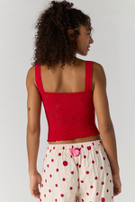 Free People Heirloom Cami in red New Love, back view on model showing square neckline straps and pointelle knit texture
