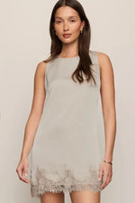 Z SUPPLY Meadow Muse Lace Mini Dress in Frosted Pearl, sleeveless shift silhouette with floral lace hem trim, front view on model.