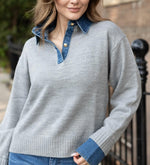 Elan Sweater Collared Denim in grey — model wearing relaxed grey knit pullover with denim collar and cuffs, gold snap buttons, front view
