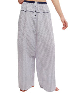 Free People Cross My Heart Lounge Pant in Ivory Combo, navy pinstripe wide-leg silhouette with elastic waistband and button fly, front view on model