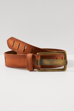 Free People WTF Jona Belt in Rustic Russet — tan leather with slot perforations and antique brass rectangular buckle, coiled flat lay