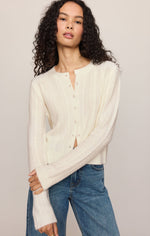 Z SUPPLY Medina Pointelle Cardigan in Cloud, front view on model, cream knit with button front and flared cuffs