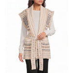 Elan Sweater Slvless Cardi in off white with geometric Fair Isle pattern, fringe trim, belt tie, and front pockets, worn over cream top