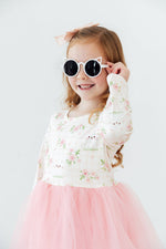 Mila Spring Kittens L/S Tutu Dress on young girl — cream floral kitten print bodice with pink tulle skirt and long sleeves