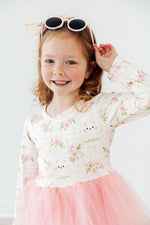 Mila Spring Kittens L/S Tutu Dress on smiling girl, white floral kitten print bodice with pink tulle skirt