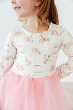 Mila Spring Kittens L/S Tutu Dress close-up on girl, featuring pink floral kitten print bodice and pink tulle skirt