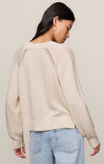 Z SUPPLY Stratton V-Neck Sweater in Sandstone — back view on model, cream knit with pointelle shoulder details and ribbed hem