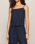 Z Supply Lille Embroidered Woven Tank in Eclipse navy, front view on model, featuring lace trim, spaghetti straps, and pintuck details.
