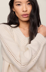 Z SUPPLY Stratton V-Neck Sweater in Sandstone — close-up detail view showing pointelle knit trim, cable texture, and V-neckline on model