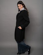 RD Style Despina Ladies Scuba Coat in black with grey hoodie lining, side view on model with wide-leg jeans