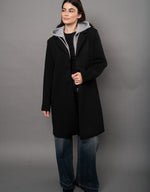 RD Style Despina Ladies Scuba Coat in black with grey hoodie insert, front view on model wearing wide-leg jeans