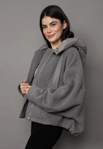 RD Style Cali Melton Jacket in Grey Melange, model wearing oversized zip-up with nylon detachable hood, three-quarter view