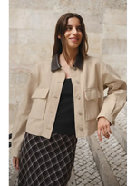 Z SUPPLY Rey Cropped Chore Jacket in soapstone beige with dark leather collar, cargo pockets, and button front, worn by model