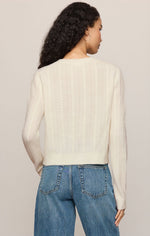 Z SUPPLY Medina Pointelle Cardigan in Cloud, back view on model, cream cable-knit texture, long sleeves, paired with blue jeans