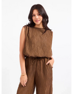 Sadie and Sage Sepia Sky Bubble Top in bronze olive, sleeveless crinkle fabric with boat neckline, worn with matching wide-leg pants