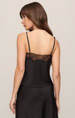 Z SUPPLY Kori Lace Inset Cami in black — back view on model showing lace trim band, thin adjustable straps, and satin finish